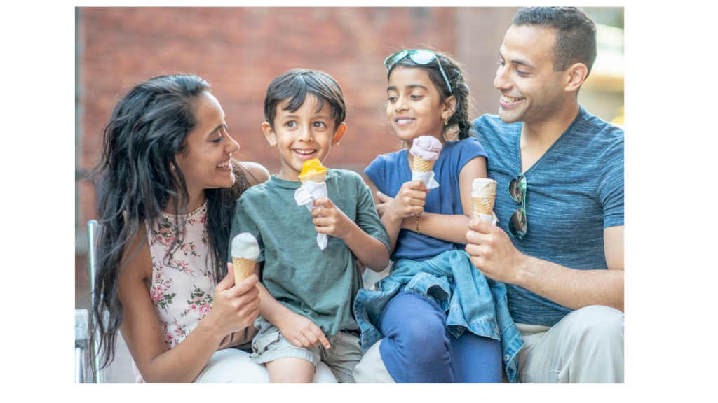 A family eating ice cream to celebrate the habit of reading in the summer.