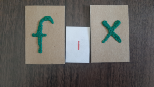 Make textured letters from glue and craft sand on cardboard.