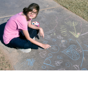 Sidewalk chalk spelling is outdoors and fun!