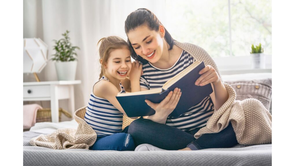 A homeschool mom reading aloud to her daughter.